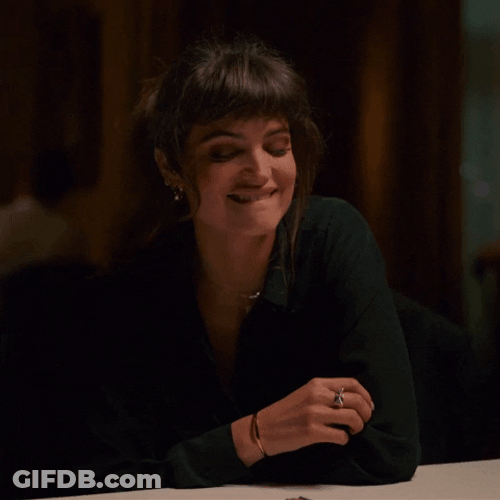 Charlbi Dean Chuckle GIF