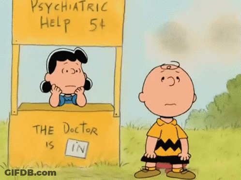 Charlie Brown And Lucy Brown Stand In Front Of A Psychiatric Help Booth GIF