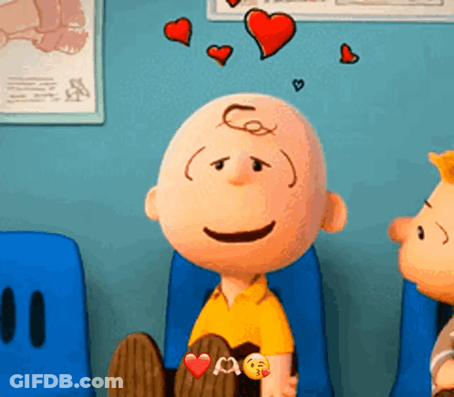 Charlie Brown From The Peanuts Movie Is Sitting In A Waiting Room Surrounded By Hearts GIF