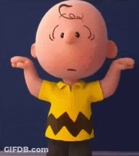 Charlie Brown From The Peanuts Movie Is Standing With His Arms Outstretched And Looking At The Camera . GIF