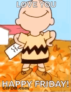 Charlie Brown Holding Paper In Leaves GIF