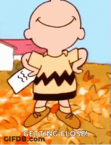 Charlie Brown Smiling Holding Paper GIF