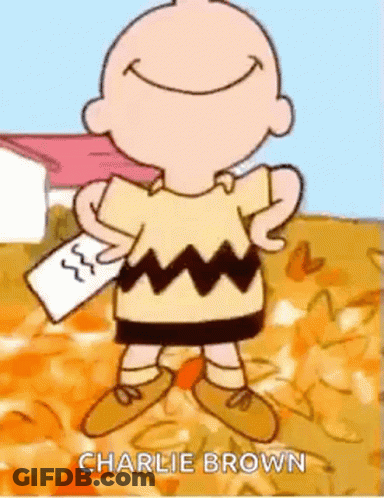 Charlie Brown Smiling Holding Paper GIF