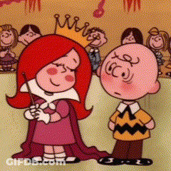 Charlie Brown Standing Next To Little Girl With Red Hair GIF