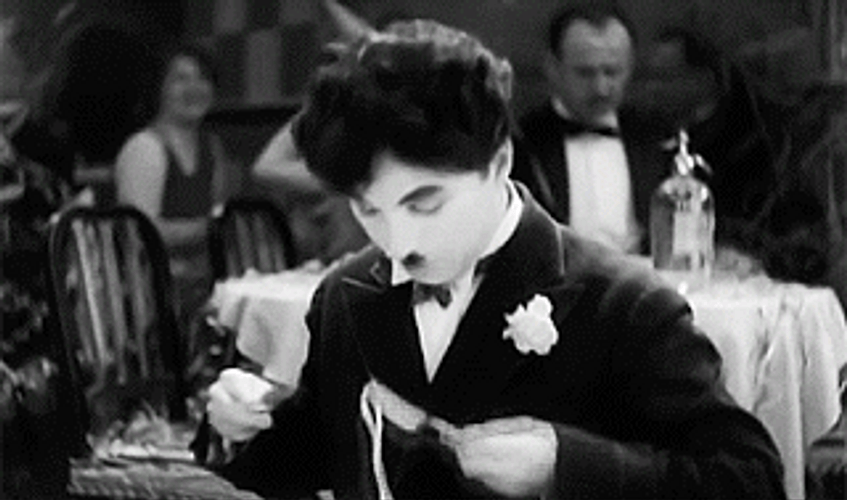 Charlie Chaplin Eating Pasta GIF