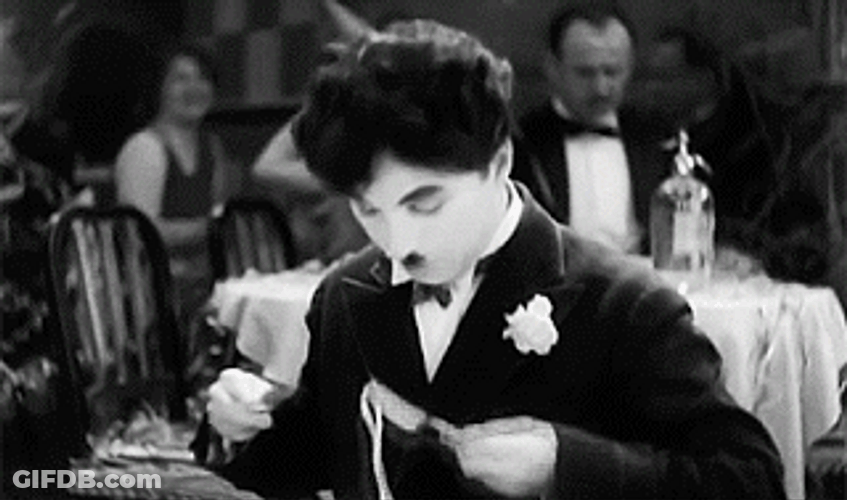 Charlie Chaplin Eating Spaghetti GIF