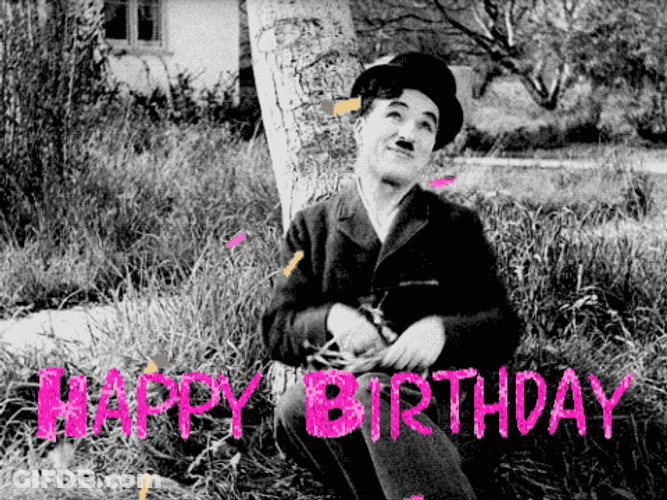 Charlie Chaplin Throwing Birthday Confetti GIF