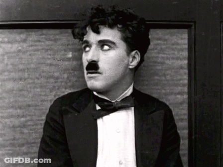 Charlie Chaplin Wink GIF