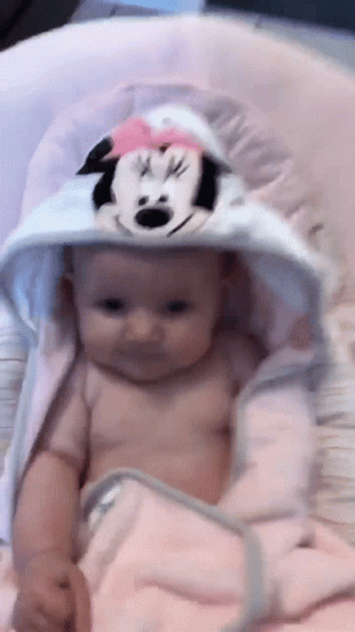 Charming Baby Winking Mickey Mouse GIF