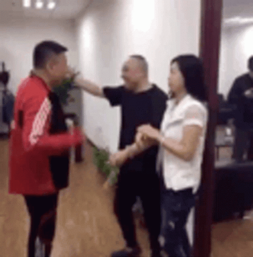 Cheating Wife Behind Her Husband GIF