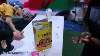 Cheerios Box Next To Puppet GIF