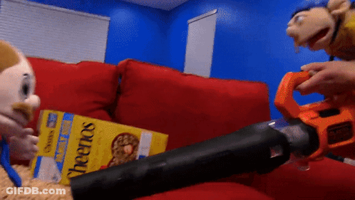 Cheerios Box On Couch Next To Vacuum GIF