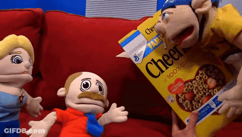 Cheerios Box On Red Couch With Stuffed Animals GIF
