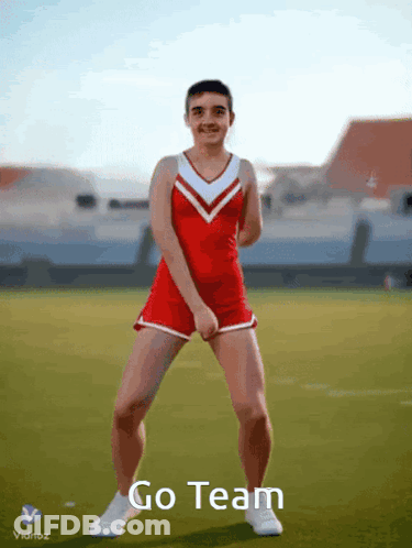 Cheerleader Dancing On Field Saying Go Team GIF