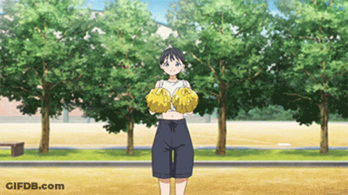 Cheerleader Holding Yellow Pom Poms GIF
