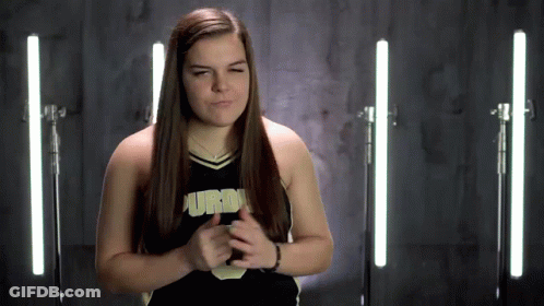 Cheerleader In Purdue Uniform Making Face GIF