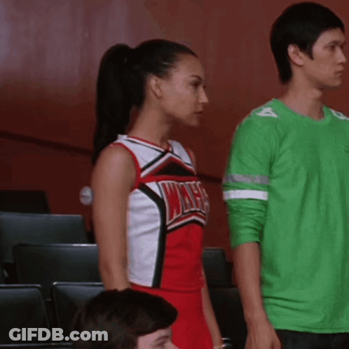Cheerleader In Red And White Uniform Saying Wives GIF