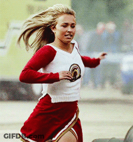 Cheerleader In Red Skirt And White Top With Rainbow GIF