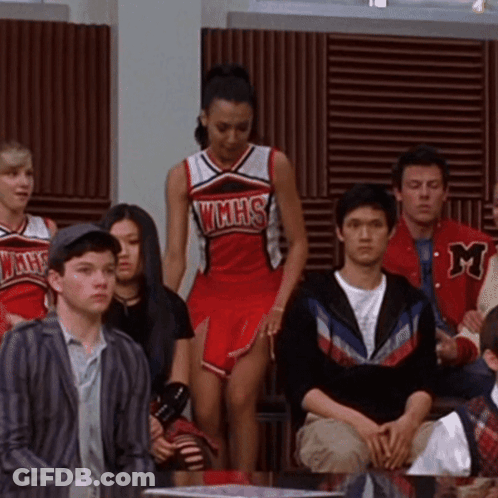 Cheerleader In WMHS Uniform In Crowd GIF