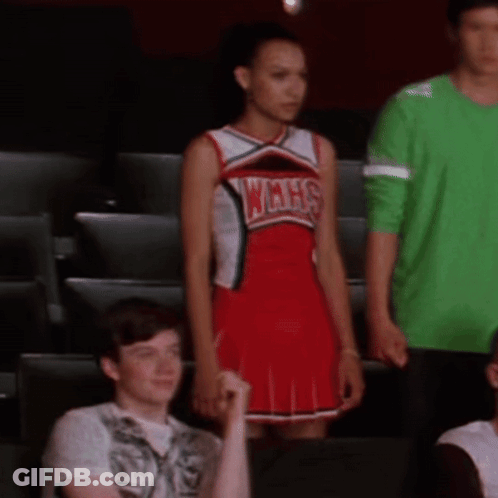Cheerleader In WMHS Uniform In Stadium GIF
