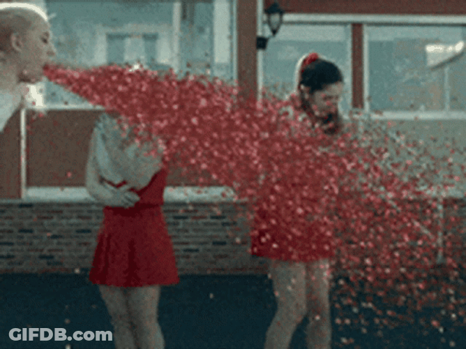 Cheerleader Puking Red Glitter Bomb GIF