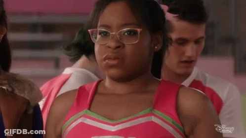 Cheerleader With Glasses And Pink Top GIF