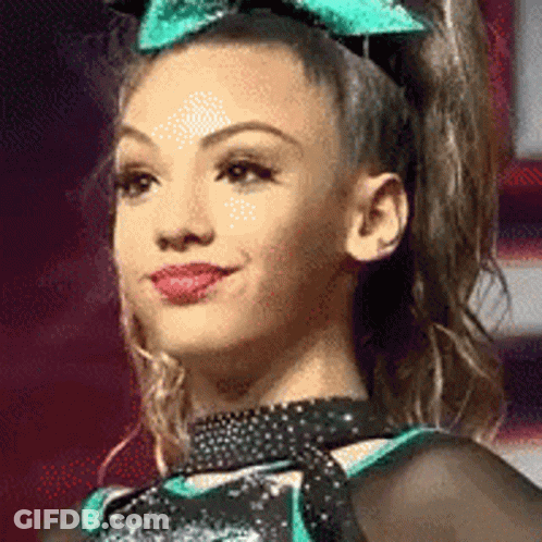Cheerleader With Green Bow And Black Choker GIF