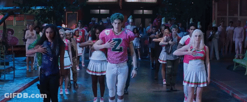 Cheerleaders And Football Player With Letter Z GIF
