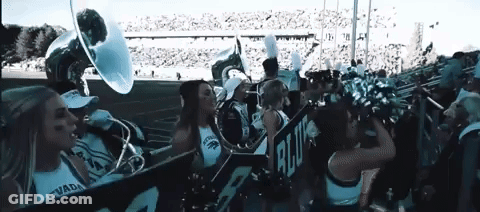 Cheerleaders And Marching Band With Nevada Banner GIF