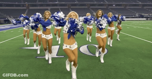 Cheerleaders Dancing On Field With Letter O GIF