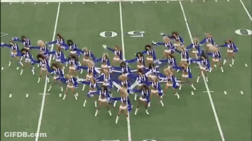 Cheerleaders Dancing On Football Field With Number 50 GIF