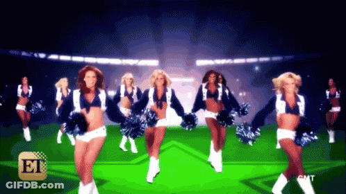 Cheerleaders Dancing On Green Field With ET Logo GIF