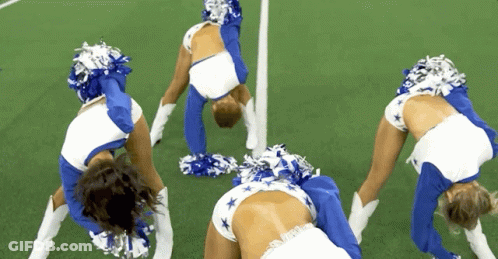 Cheerleaders Doing Handstand On Field GIF