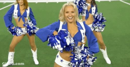 Cheerleaders In Blue And White Star Uniforms On Field GIF