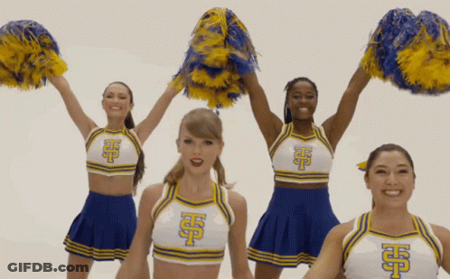 Cheerleaders In Blue And White Uniforms With Letter H GIF