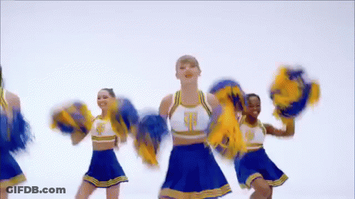 Cheerleaders In Blue And Yellow Holding Pom Poms GIF