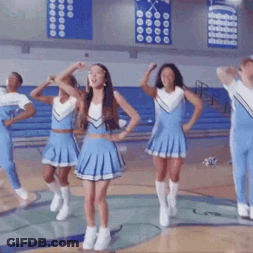 Cheerleaders In Blue Uniforms Dancing GIF
