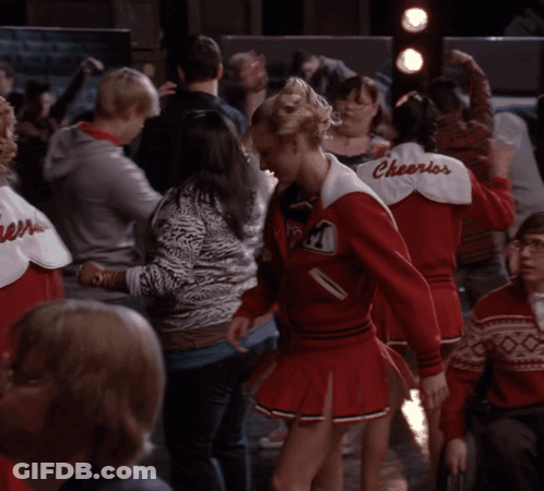 Cheerleaders In Red Uniforms With Cheerios GIF