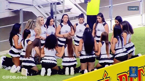 Cheerleaders Kneeling On Field With FC Logo GIF