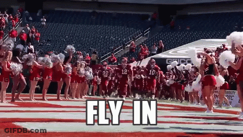 Cheerleaders Leading Football Team GIF