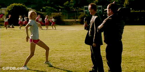 Cheerleaders On Field With Reporter GIF