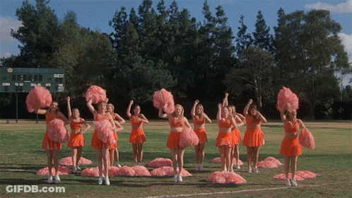 Cheerleaders Performing In Front Of Guest Scoreboard GIF
