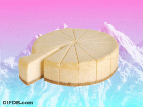 Cheesecake With Slice Taken Out On Mountain Background GIF