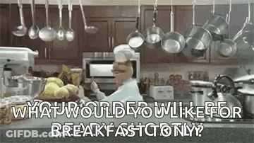 Chef Cooking In Kitchen With Pots And Blender GIF