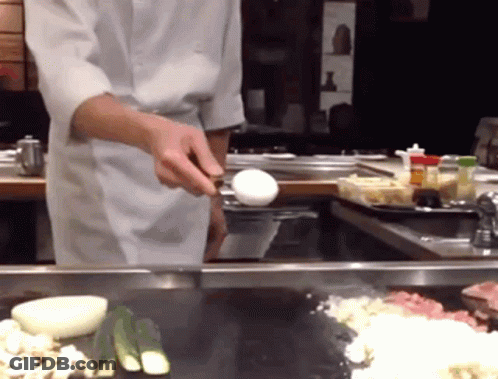 Chef Cooking Vegetables On Stove GIF