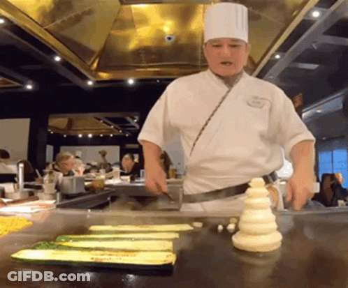 Chef Cooking Vegetables On Stove GIF
