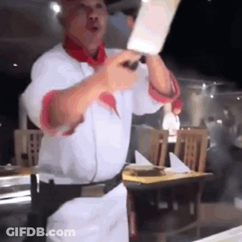 Chef Holding Large Knife GIF
