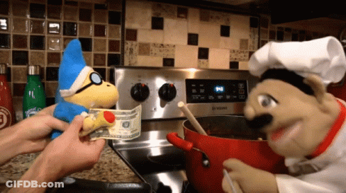 Chef Puppet Holding Dollar Bill In Front Of Samsung Appliance GIF