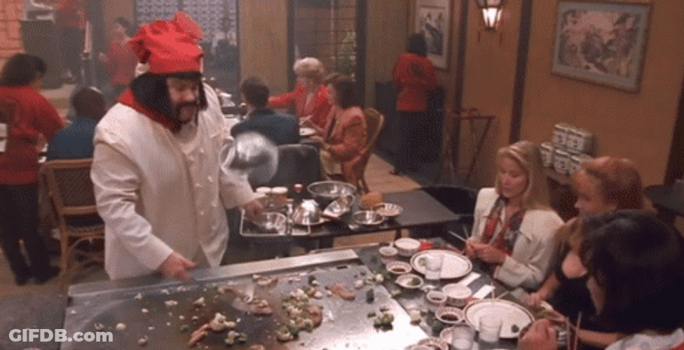 Chef Puts Hibachi On His Head GIF