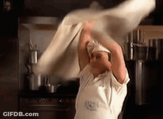 Chef Spinning Massive Pizza GIF